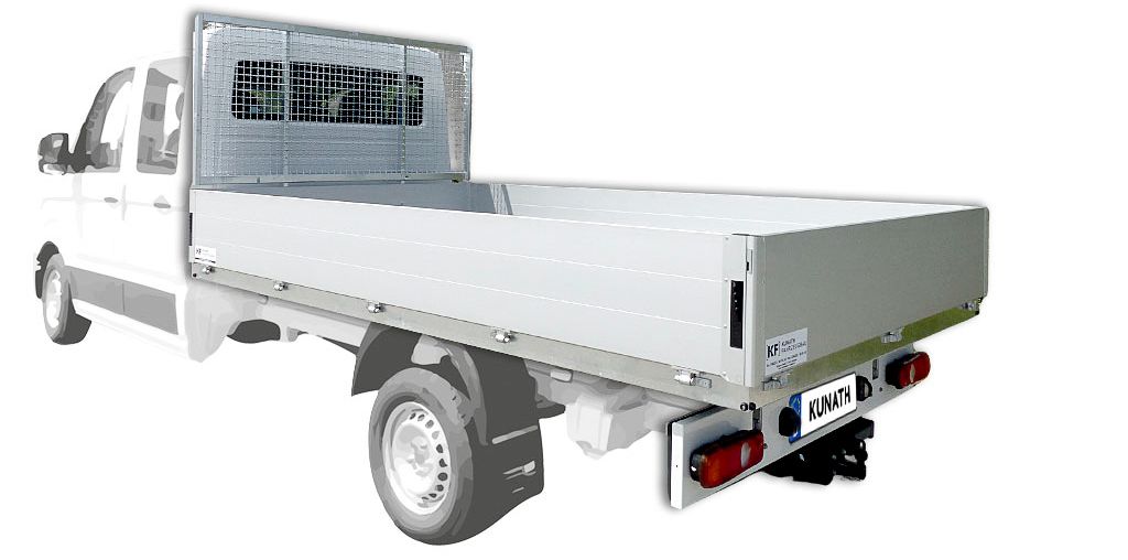 Ein Transporter Umbau und Aufbau eines weißen Pritschenfahrzeugs von Kunath Fahrzeugbau.